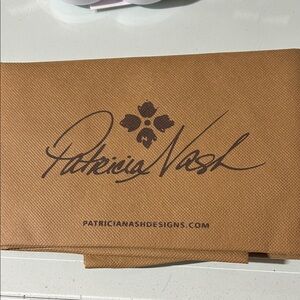 Patricia Nash Tan purse dust bag